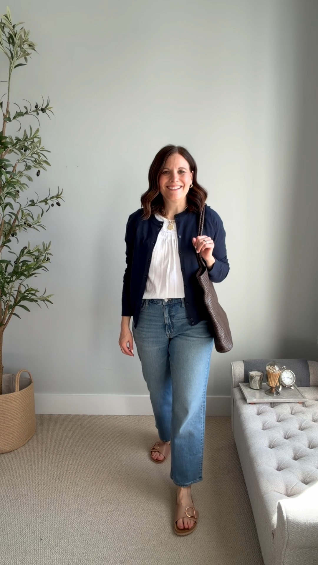 Spring jeans capsule wardrobe outfit fit notes: LOFT white blouse fits loose, I’m in a Small. Wear it out or front-tucked. Cardigan fits small, sized up to large for easy layering. Curvy midrise straight jeans fit true to size (tts), slides fit tts. 

#LTKOver40 #LTKMidsize #LTKSaleAlert