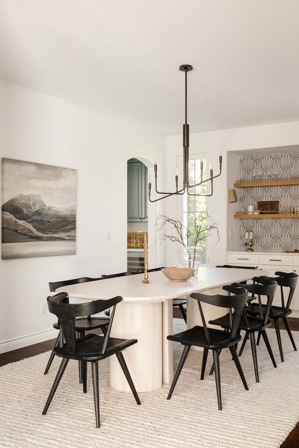 Dining room with black wood chairs and grey and ivory wool rug

Dining, dining table, dining room, dining chair

#LTKHome
