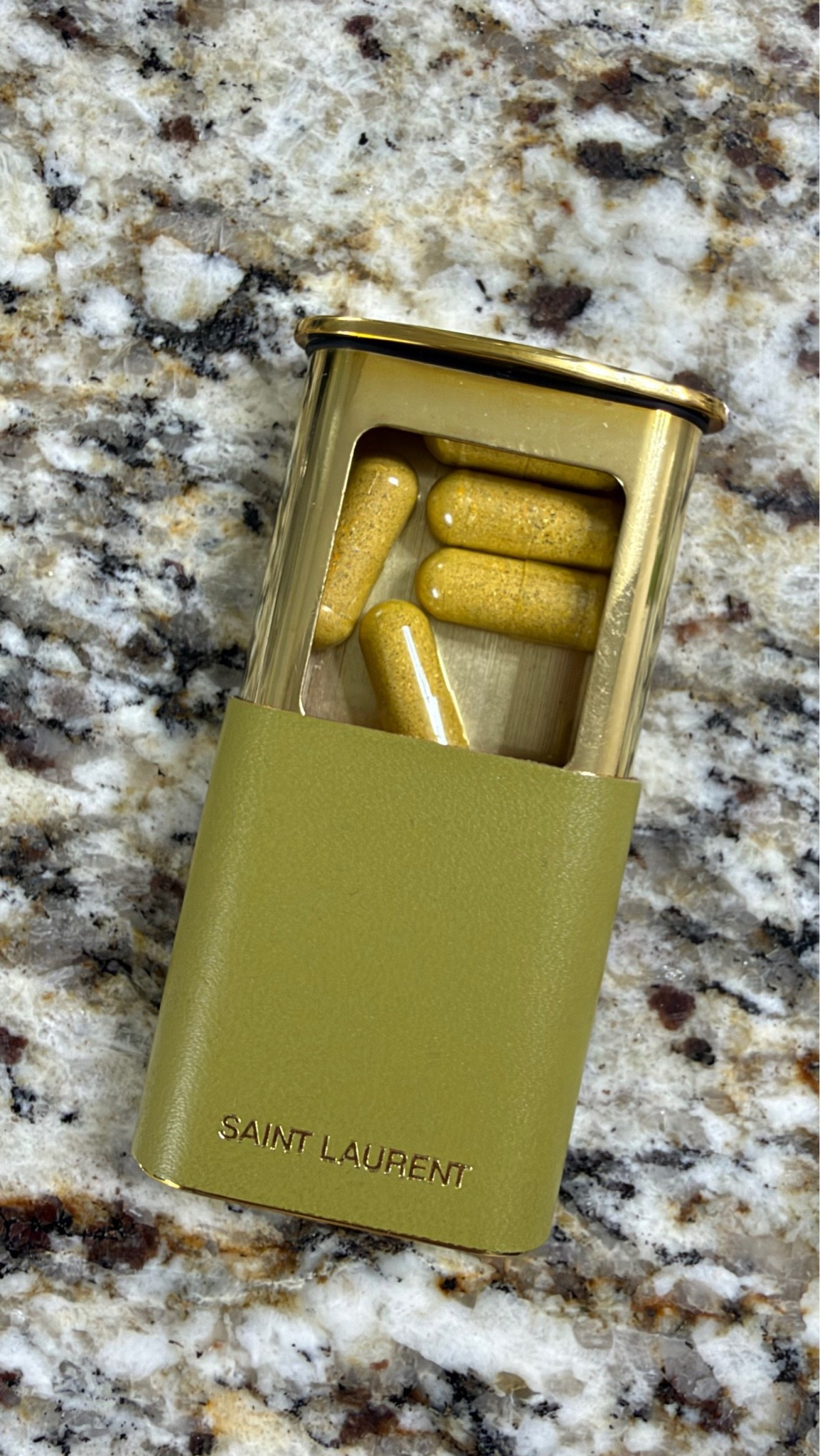 If I’m going to take all these supplements on my hair growth journey, I might as well make it chic. 💁🏼‍♀️ Enter: my Saint Laurent pill box. Because apparently even my supplements have expensive taste. 😂💚

A little excessive? Perhaps. Very me?

#LTKdayinmylife #LTKmorningroutine #LTKselfcare