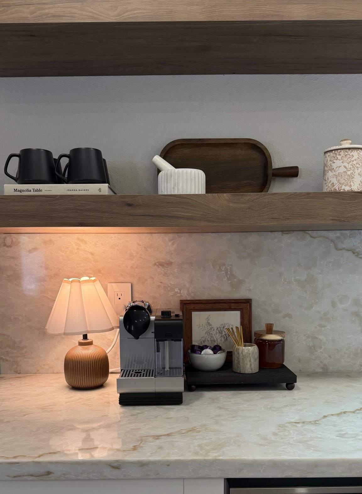 My coffee corner 🖤 I’ve had fun styling the floating shelves in our new kitchen + the new location for my coffee setup! 
•
•
Coffee bar, coffee machine, espresso machine, nespresso, shelf decor, kitchen decor, kitchen styling, decorating kitchen, kitchen shelf 

#LTKFindsUnder50 #LTKSaleAlert #LTKHome