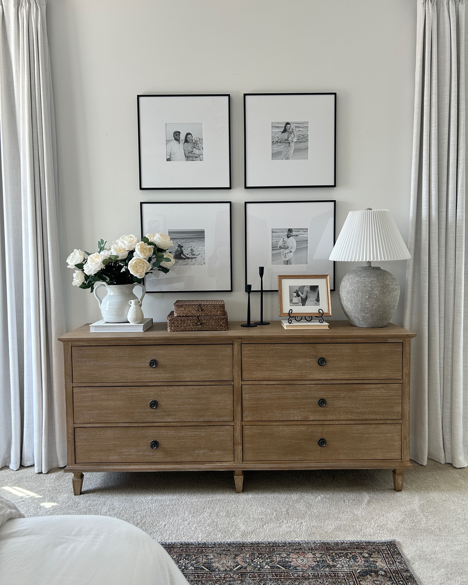 Primary room dresser and decor

My gallery wall is custom from Frame It Easy! I have them linked below, but you will need to enter in the details yourself to get my exact sizing :) Here are my frame details:

My frame details:
Art Size: 9″ x 9″
Outside Frame Size: 21 3/16″ x 21 3/16″
Style: Ashford, in Satin Black
Matting: 6″ Smooth White
Cover: Clear Acrylic

#LTKstyletip #LTKsalealert #LTKhome