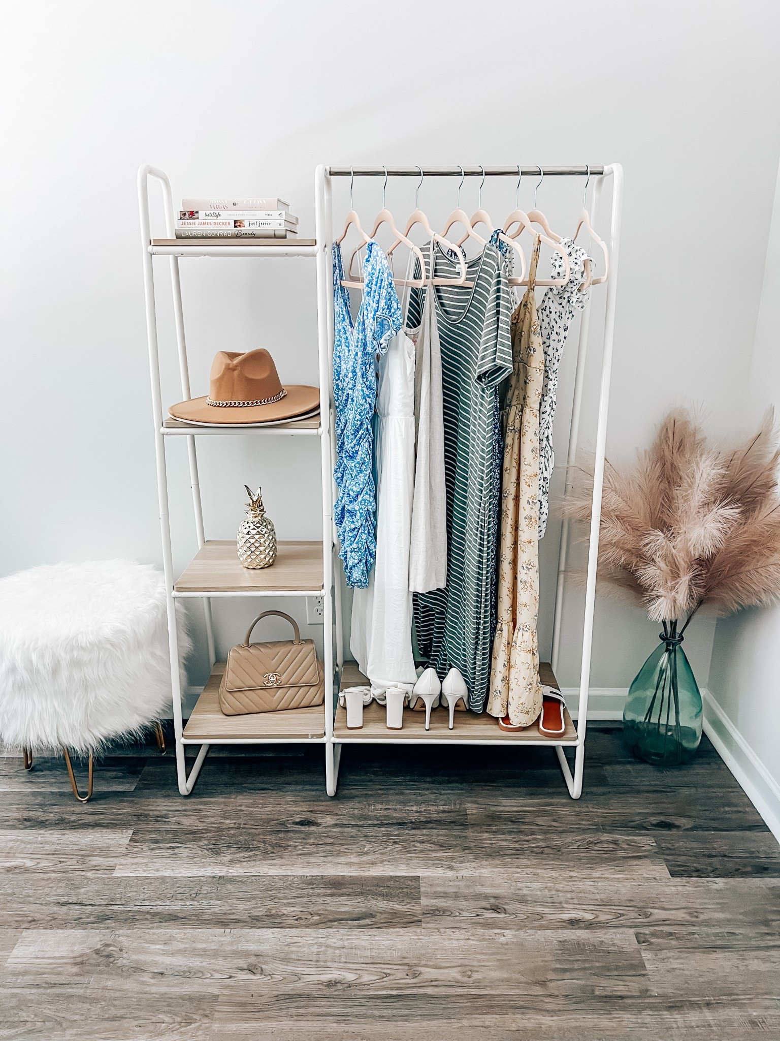 My clothing rack in my office 🫶🏻 love it so much! Linked it here along with my pink pampas grass, ottoman + more! 

Office, stool, Amazon finds, vase, home, furniture, clothing rack, target