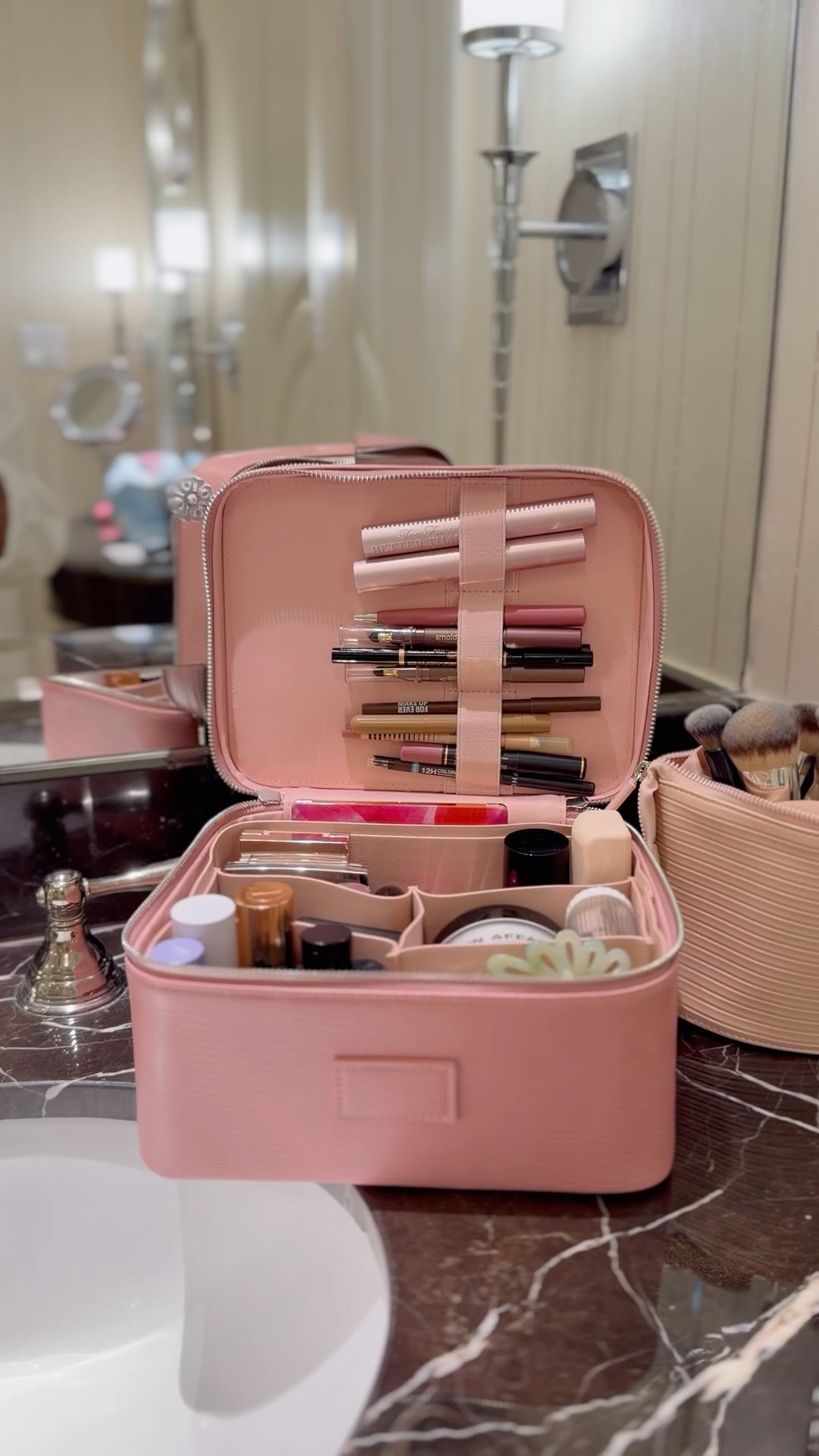 If there’s one beauty organization product I recommend over and over again, it’s my ÉTOILE Vanity Case. 🤍

I’ve tried so many makeup bags over the years, but this is the one I keep reaching for because everything has a place. No more digging through a giant bag trying to find one lipstick or eyeliner.

I have the largest size (which I LOVE because I have a lot of makeup 😅), but it comes in several sizes depending on how much you need. The removable compartments make it so easy to customize, and when eyeliner, mascara, or foundation inevitably gets on the inside… it wipes clean in seconds. 🙌

What I love most is that it isn’t just for travel. It lives on my vanity every day, keeping everything organized, and when it’s time to pack, I simply zip it up and go. When I get home, I unzip it and slide it right back under my vanity—no unpacking or reorganizing required.

If you’re someone who loves having a place for everything (or you travel often), this has honestly been one of my favorite beauty purchases. So functional, so organized, and it makes getting ready so much easier.

#LTKgrwm #LTKBeauty #LTKmorningroutine