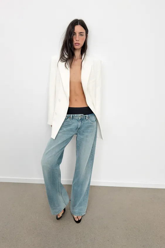 Blazer with a lapel collar and long sleeves with shoulder pads. Featuring front welt pockets, a m... | Zara UK