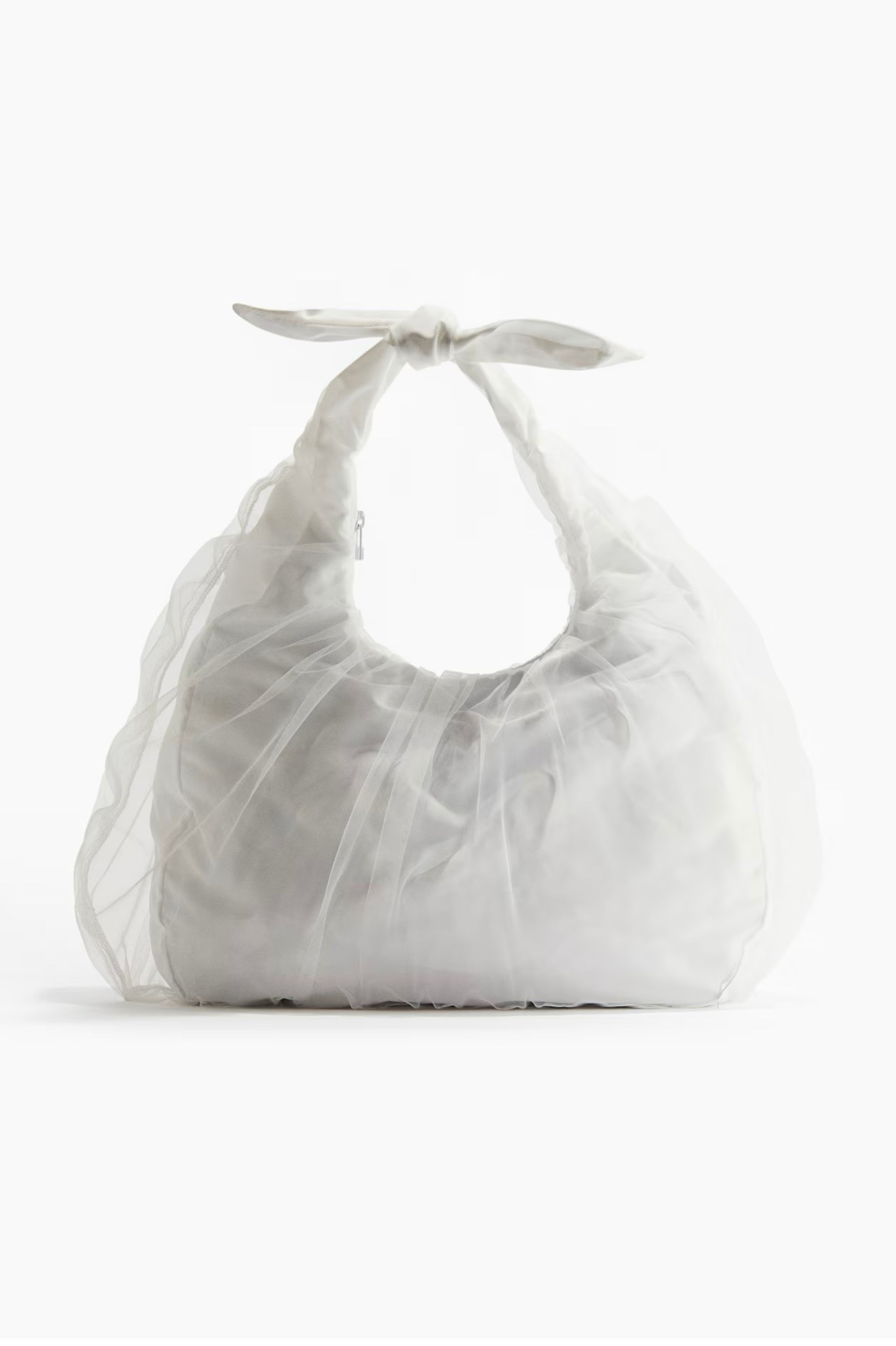 Shoulder bag in soft, woven fabric with outer layer in mesh. Handle with a decorative bow, zipper at top, and an inner compartment with zipper. Lined.



#LTKsummer #LTKfitness #LTKcanada