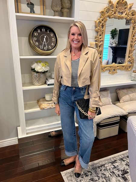 A little French vibe … outfit idea

Cropped trench coat affordable an under $49  fits tts I am in a small

High waisted wide leg big cuff denim jeans. Kut from kloth for tts  I am in a 4 

Striped tee Chicos 
TTS

Ballet flare Steve Madden tts 

Quilted Clutch Chicos last years linking this years 

#LTKMostLoved #LTKstyletip #LTKfindsunder100