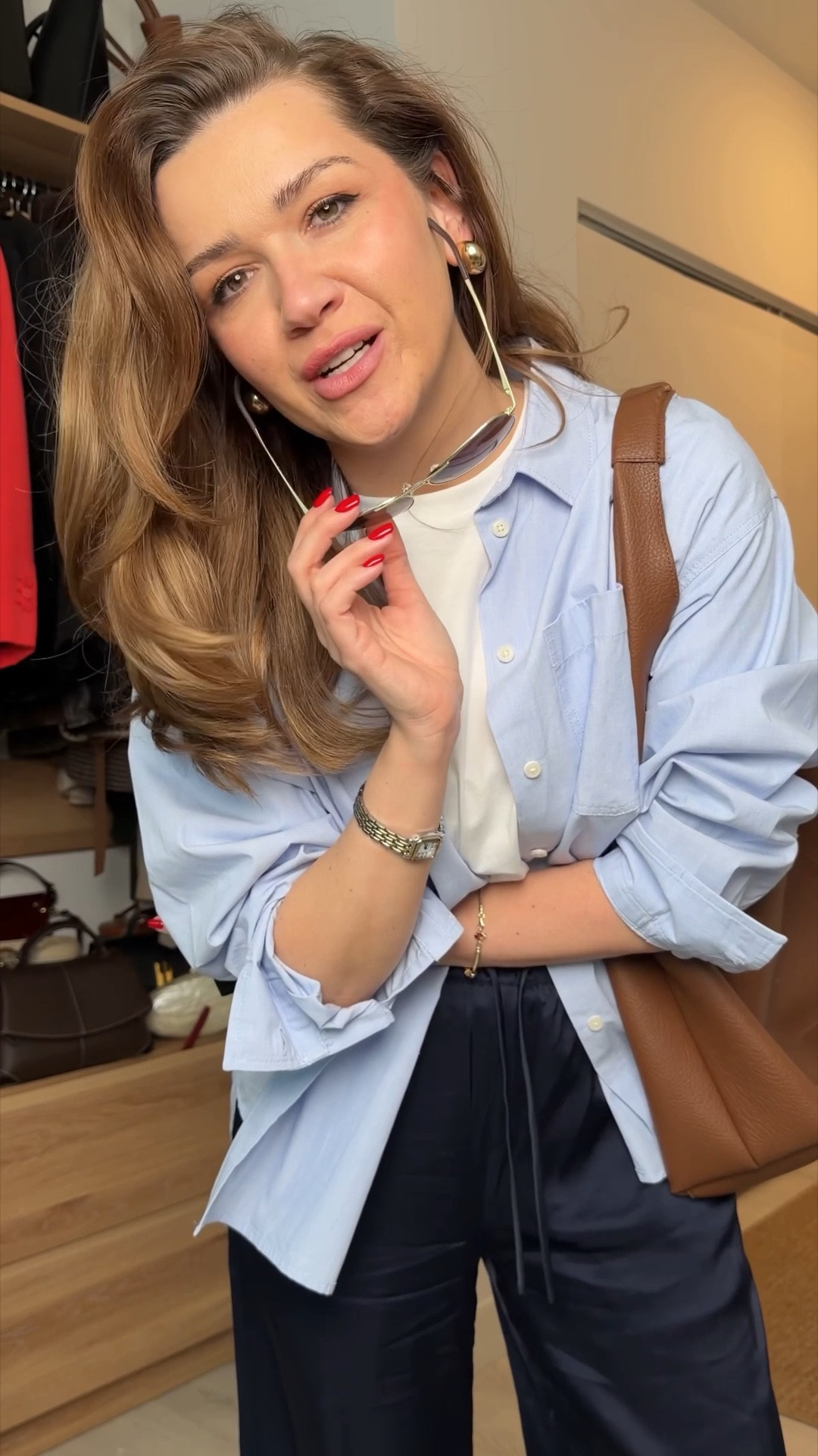 I LOVED this look in the end. 

It’s just one of those that you can repeat over and over again because it’s so effortlessly chic while remaining INSANELY comfortable 👏🏻

My exact items:
•T-Shirt | M| 100% cotton aritzia 
•Blue button up | M runs oversized | J.Crew ￼100% cotton $50
off right now! 👏🏻
• Silky pants | M| Aritzia (I like them, but not necessarily enough to justify the price - unfortunately missed the return window so I will keep wearing them lol but I did link some similar options that are priced better in my opinion!)￼
• Sneakers | 100% Sam Edelman I have had, worn, and loved these for YEARS! 👏🏻
• Bra | OEAK and ao freakin comfyyyy
• Bag | Old Banana Republic - this color is out of stock, but I linked the black one and then I also found some similar options to a tan!

￼

#LTKWorkwear #LTKgrwm #LTKSpringSale