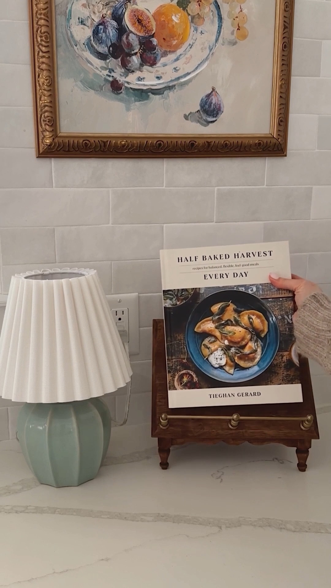 This vintage-inspired kitchen stand acts as a cookbook holder and also functions as a riser for corralling utensils or cooking supplies. I love the scalloped detailing and the brass railing. And it’s under $50! 

#LTKHome #LTKFindsUnder50