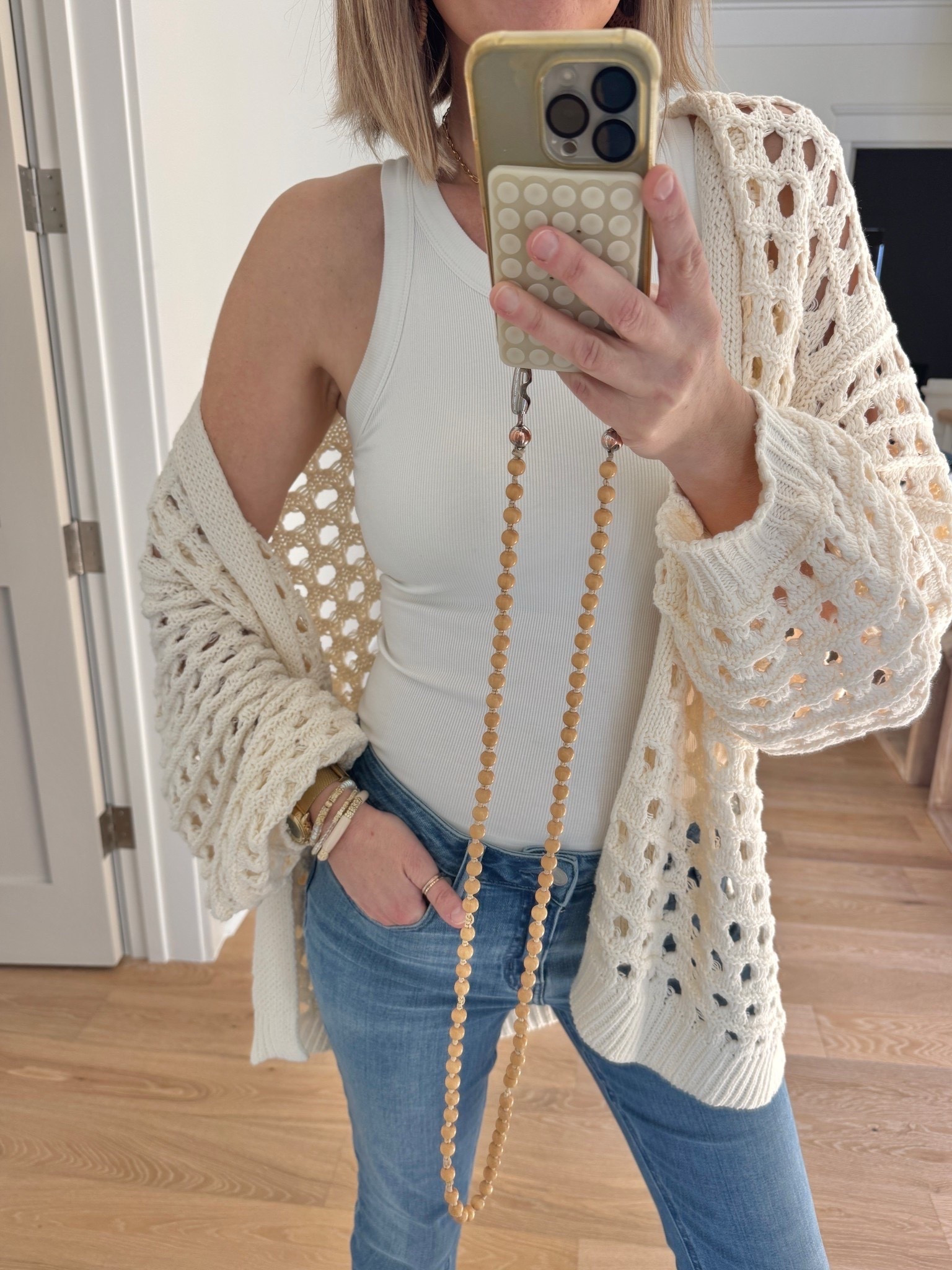 One size cardigan.   Small bra tank.  Jeans true to size.  

#LTKootd #LTKmomlife #LTKgrwm