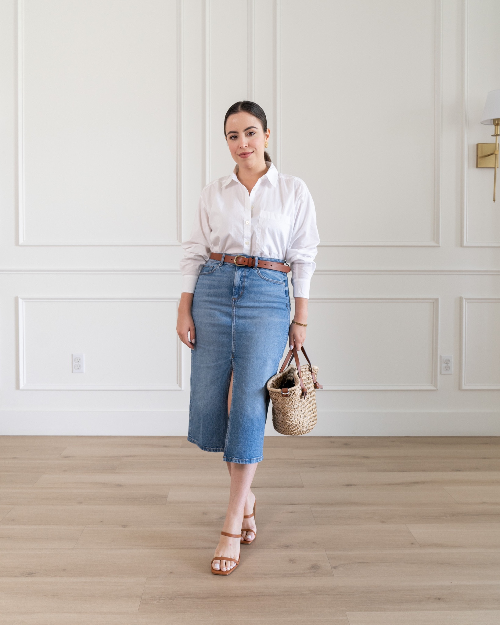 A timeless outfit! Denim midi skirt with a crisp white shirt and tan accessories. Outfit is 25% off and extra 20% off! Wearing size 0 on the skirt and XS on shirt



#LTKunder100 #LTKFind #LTKsalealert