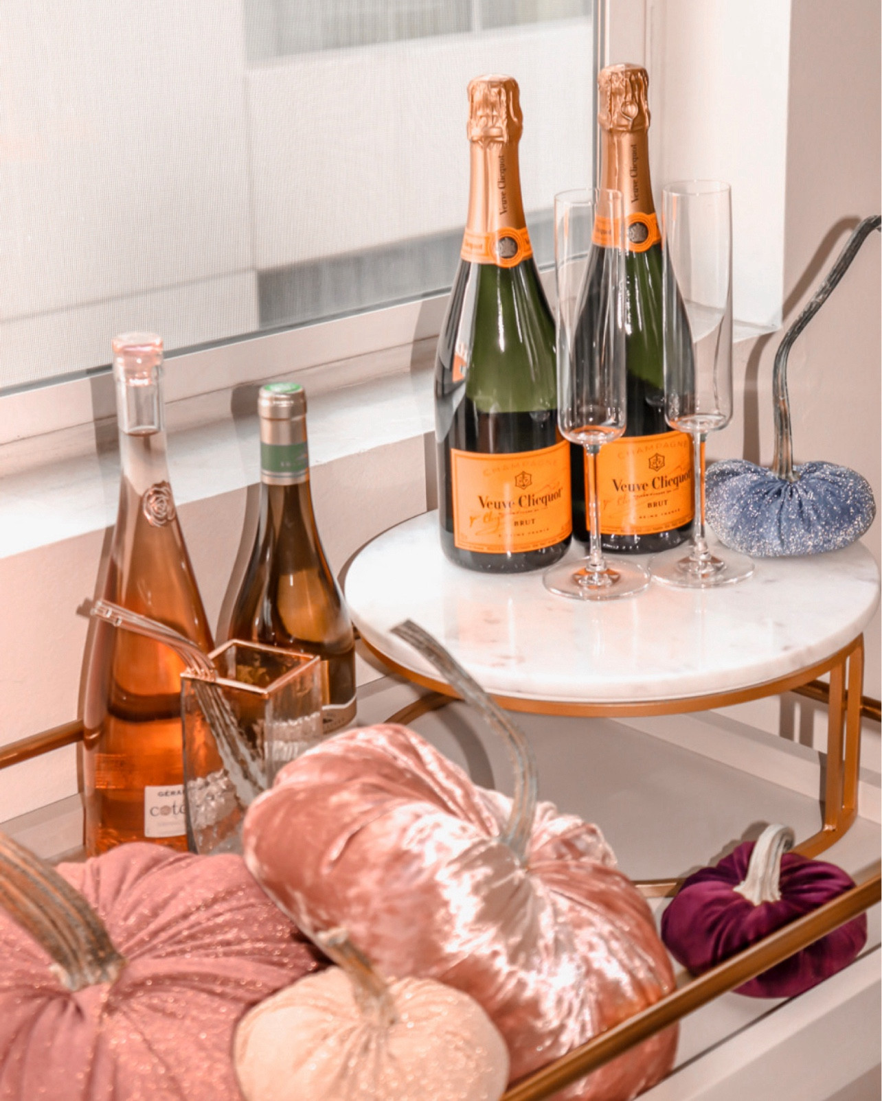 Fall Bar Cart Decor 
Fall Bar Cart Styling 
Wine glass 
Electric wine opener 
Bar cart 
Marble cake stand serving tray
West elm 
Velvet pumpkins 
Gold straws 
Serving tray 
Faux stems 
Artificial stems 
Living room 
Home 
Dining room 

#LTKStyleTip #LTKSeasonal #LTKHome