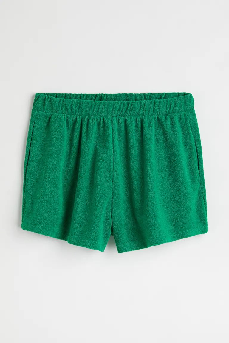 Relaxed-fit shorts in soft terry. High waist, covered elastic at waistband, and discreet side-sea... | H&M (US + CA)