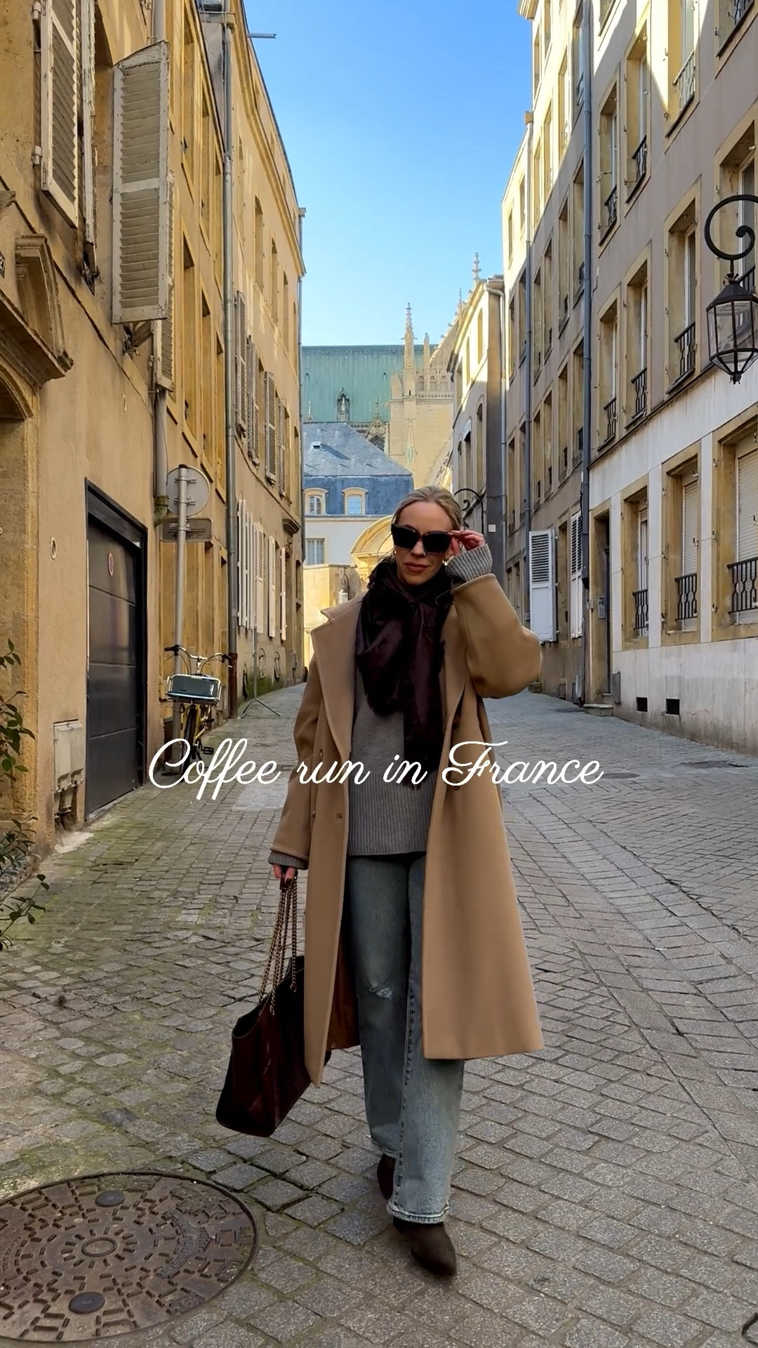 European vacation style, camel coat, YSL brown monogram scarf, @Levi's bootcut jeans, chic travel style, burgundy YSL tote bag

#LTKSeasonal #LTKdayinmylife #LTKTravel