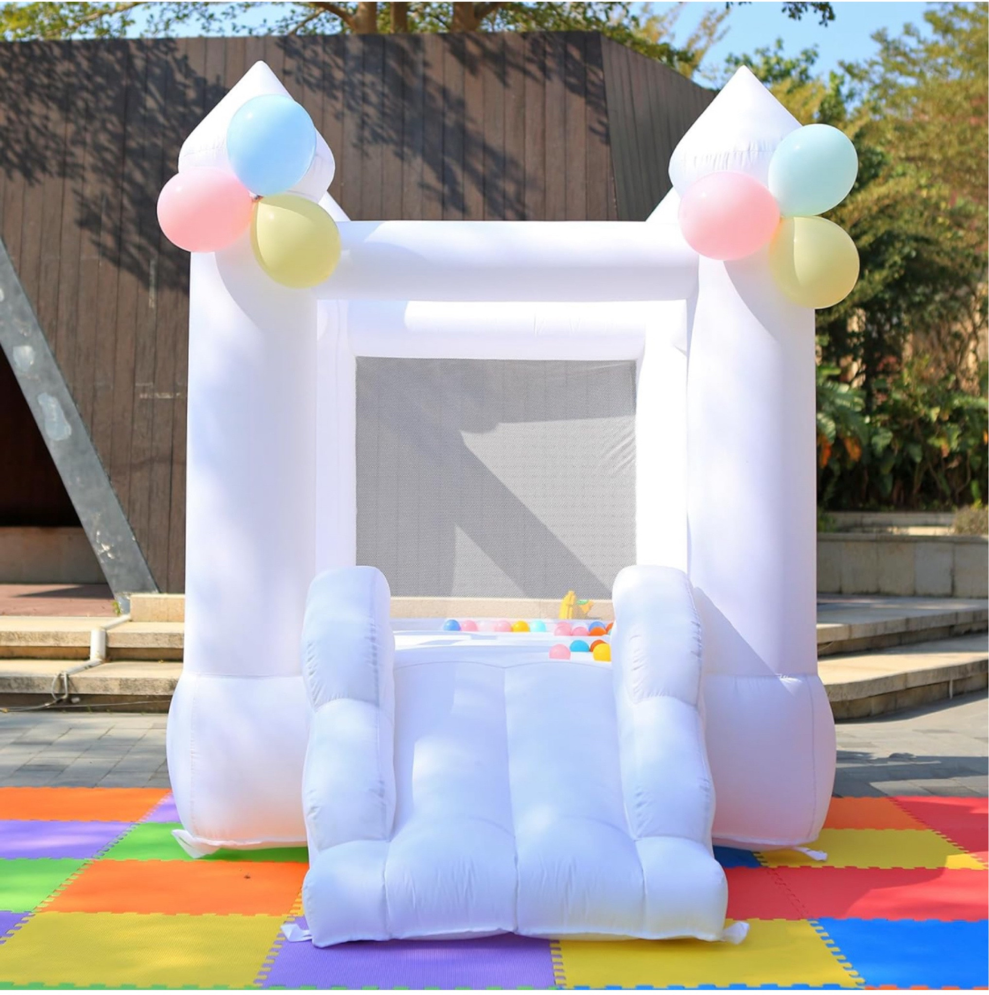Toddler Bounce House - White Castle Bounce House 
7.5ft tall - 8.5 long 