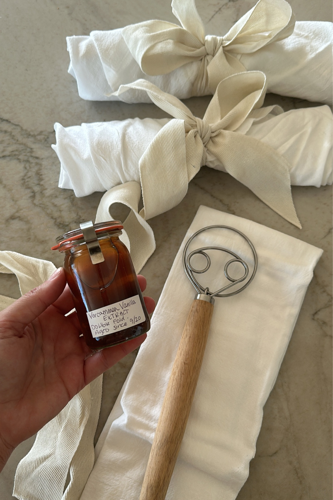 $10 gift idea! Vanilla extract with a towel & whisk. I made the vanilla myself with @vercammenvanilla but you can make it at home with vanilla beans and vodka over time  

#LTKHoliday #LTKSeasonal #LTKGiftGuide