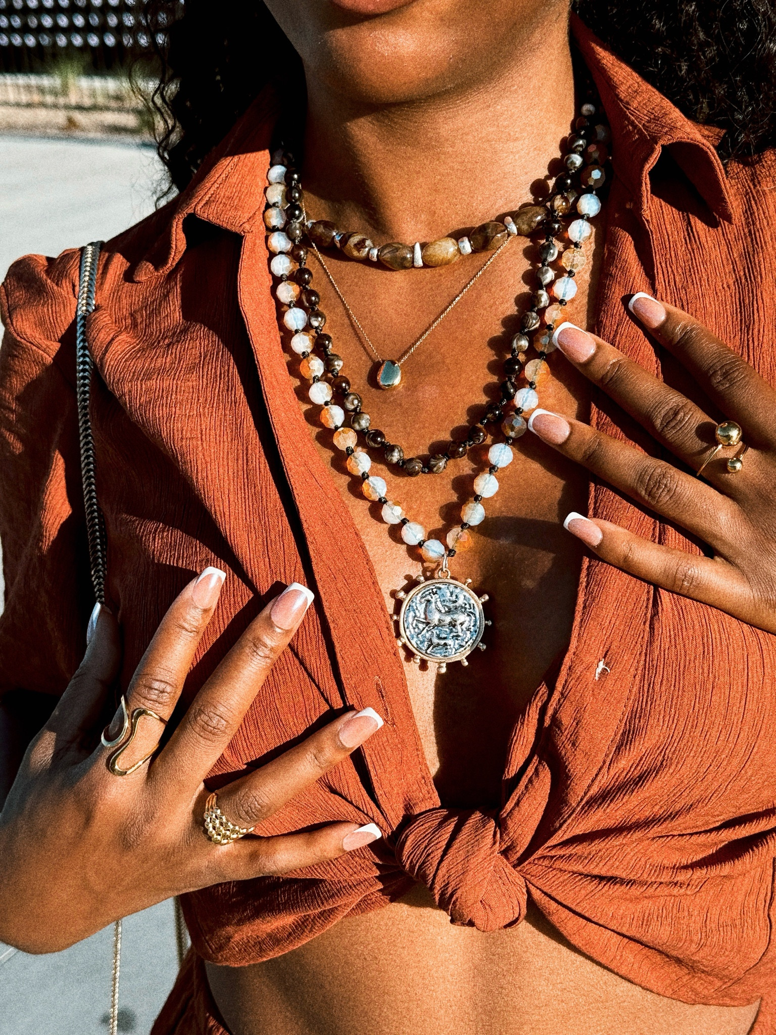 Stunning statement pieces! This Zara necklace set came with 4 separate necklaces. I wore 3 here paired with an Ana Louisa necklace. The rings are from avaria jewelry 