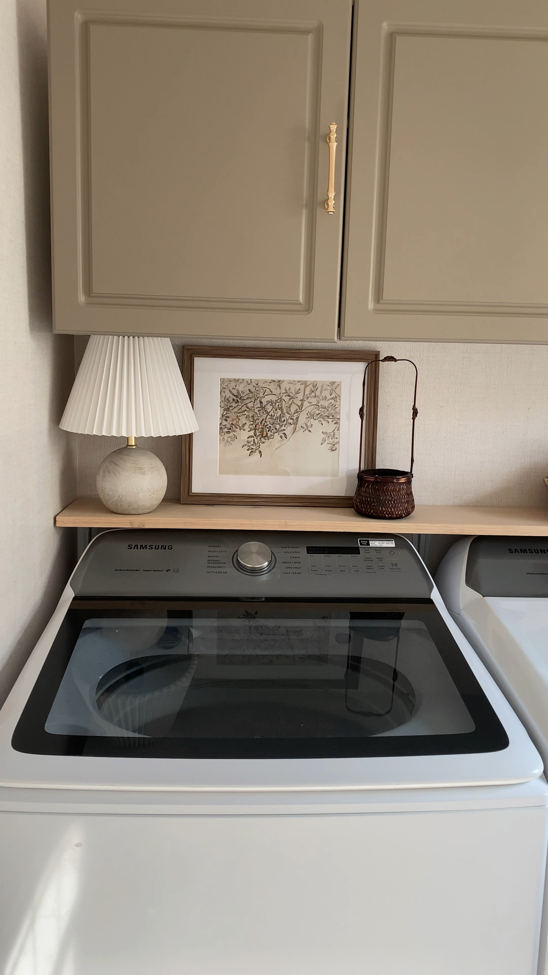 ✨ Laundry room vibes ✨ 

I haven’t photographed this space in a long time, let’s just say it brought back memories of laying this linen wallpaper in one whole day! Was no easy feat but totally worth it 👏🏼🤍





#laundryroom #styling #amazonfinds #lamp #basket #rug #makeover #transtional #modern #vintage #target #amazon #finds #find #cabinets #shelf #home #bedroom #livingroom 

#LTKstyletip #LTKhome #LTKFind