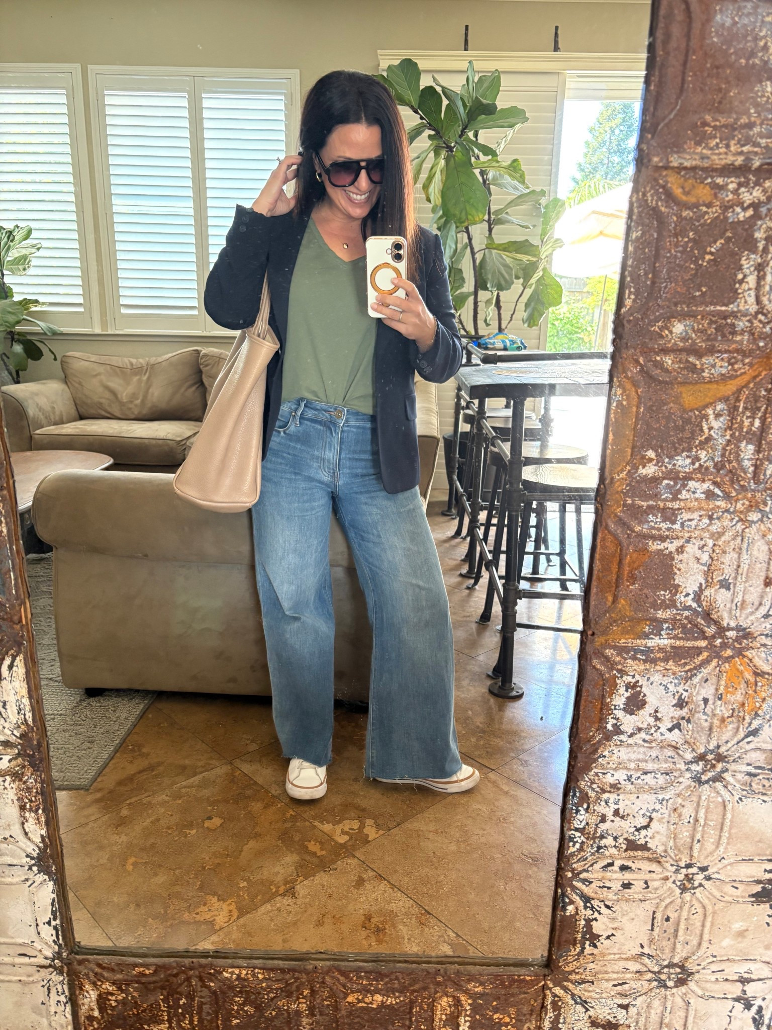 Easy teacher business casual outfit. Navy blue blazer, olive v neck t-shirt, wide leg jeans and sneakers. 
Spring outfitt

#LTKWorkwear #LTKPetite #LTKOver40