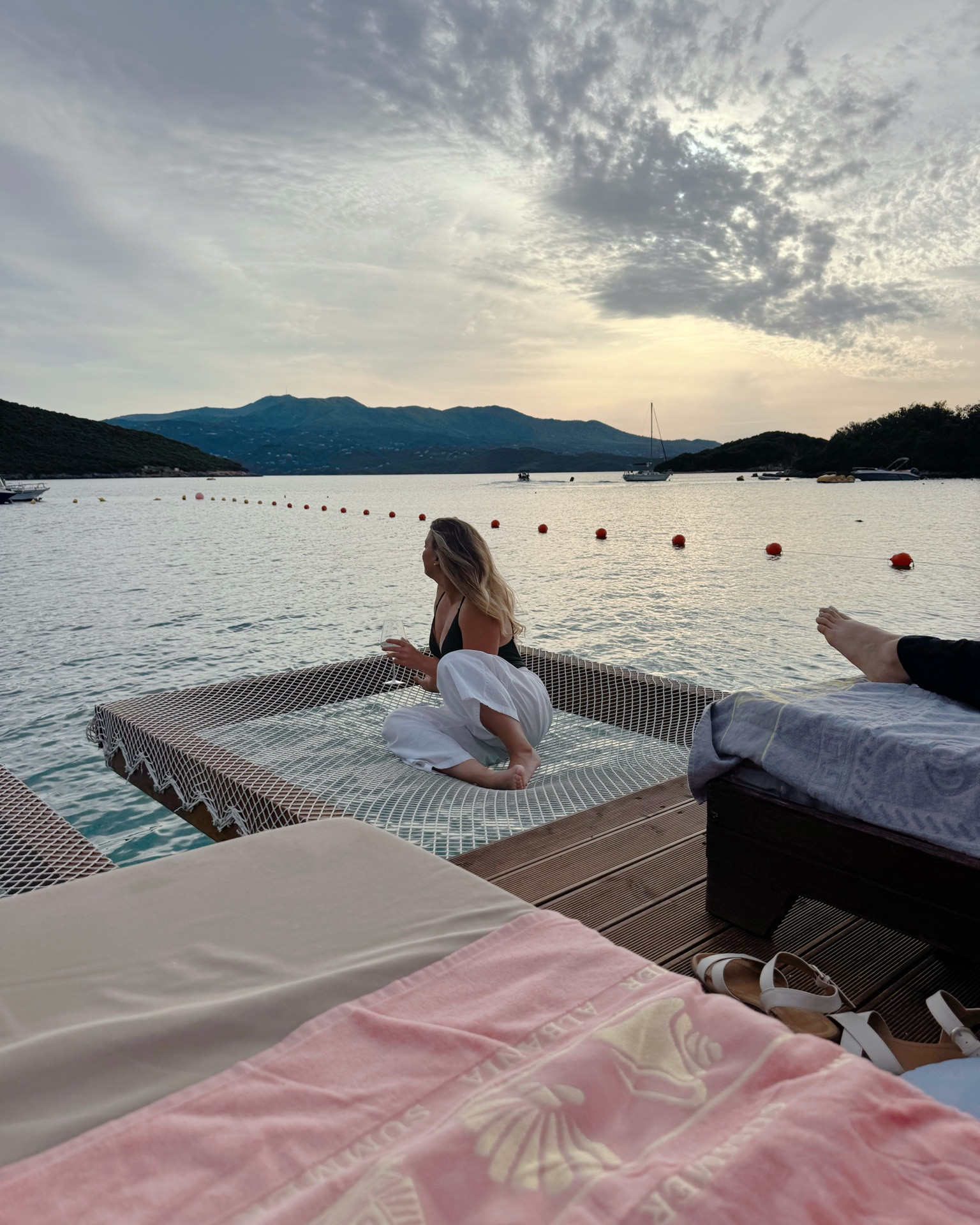 I would live here in this Ksamil, Albania sunset 🌅 

Wearing a one piece suite from last year at Target by Cupshee and white linen pants from Amazon. 

I was fully ready to lay here all night on the over water bungalow bed 🌊 

Items linked for you!  The suite is the exact in a different color.  I originally purchased the one piece for family friendly trips, but now I wear it even on trips with just my boyfriend because it feels so cute and sexy still with the plunge v on the chest!

#LTKTravel #LTKSwim #LTKdayinmylife