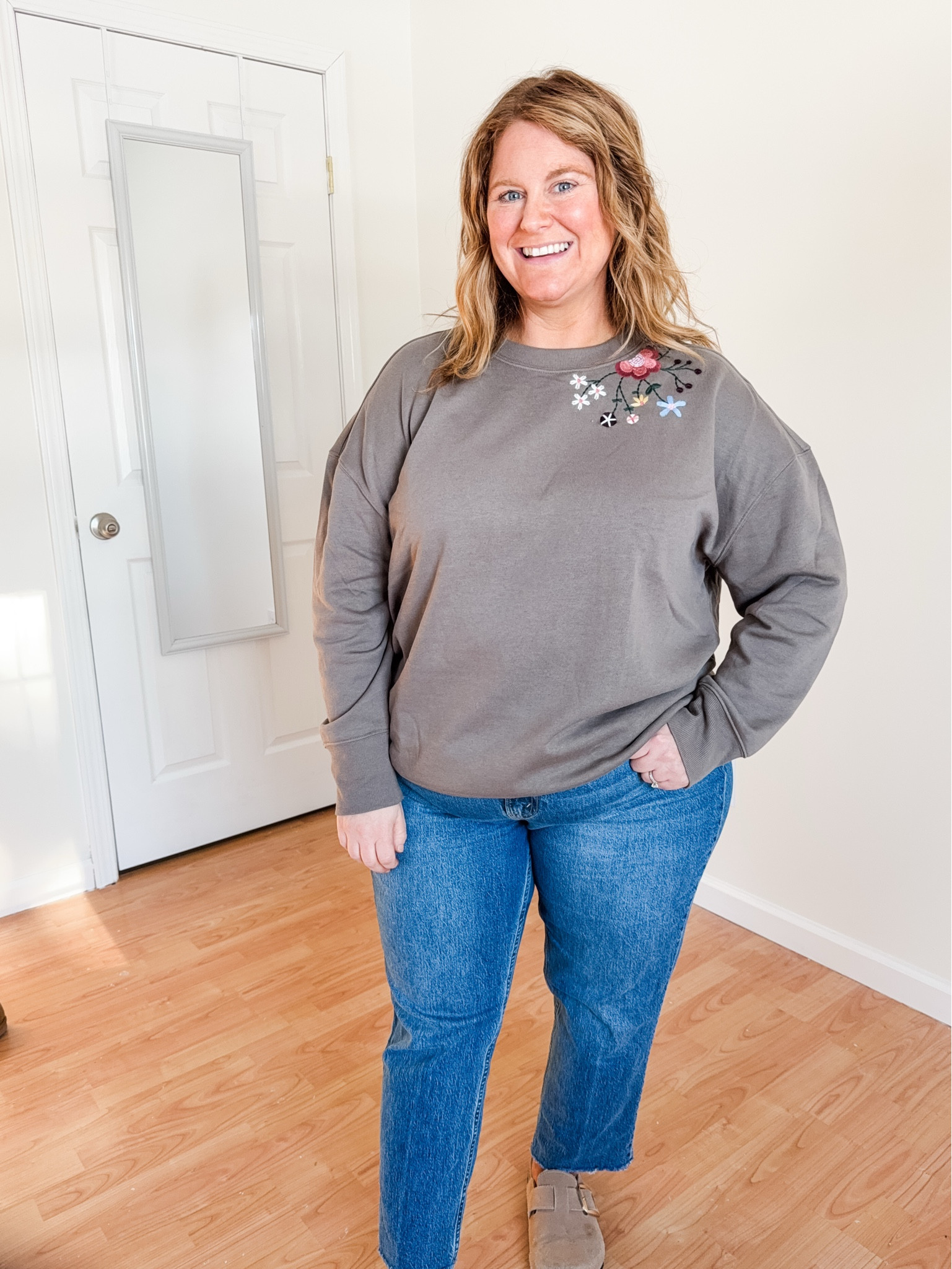 Wearing a 1x in the sweatshirt (sized up so I could wear with leggings) and a 33 short in my jeans.  I love the embroidery on the sweatshirt! 

#LTKSaleAlert #LTKMidsize #LTKSeasonal