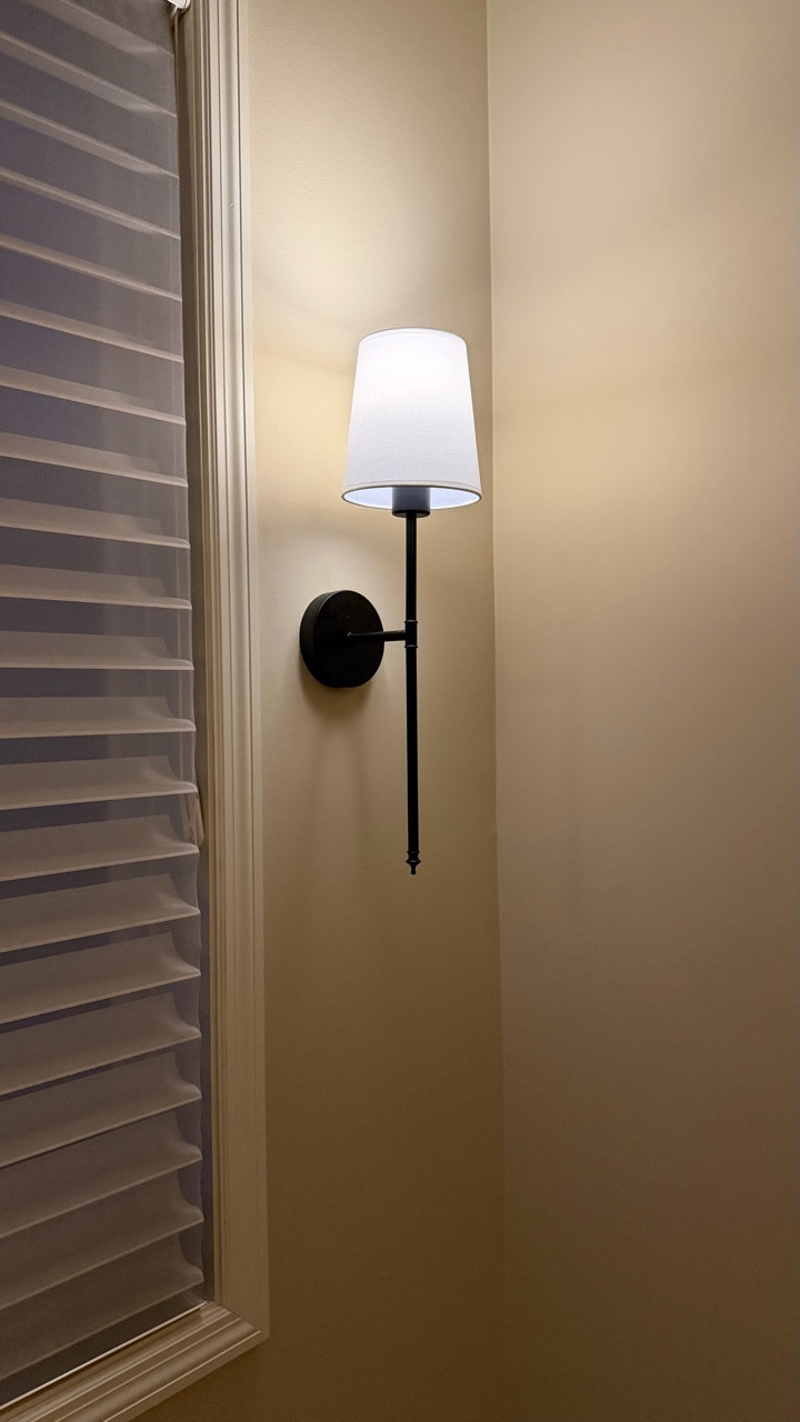 Adding sconces here instantly made this area feel warmer, more intentional, and beautifully balanced with the window.

I especially love how this space feels in the evenings when the soft glow lights the way upstairs. 

Sometimes it’s the smallest design details that make the biggest difference.

✨If simple and inviting decor is your vibe, follow along for more inspiration!
•
•
•
cozy home, classic decor, lighting design, wall lighting, stairwell decor, interior inspiration, neutral home, classic decor

#LTKHome