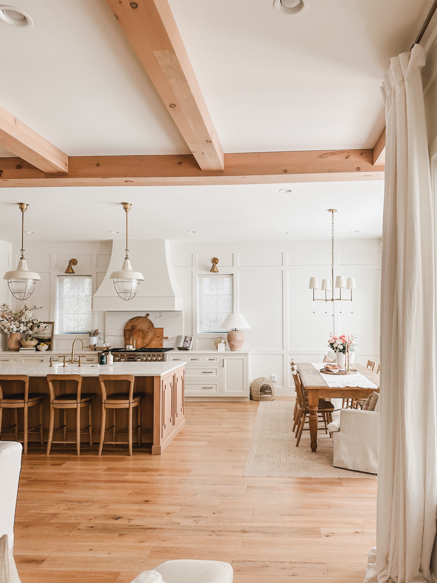 Light and bright kitchen views with open concept dining, neutral wood tones, and seasonal faux florals.

Kitchen views, summer style, light and bright, Pottery Barn style, open concept dining, counter stool, lighting detail, gold detail, faux florals, curtain detail, kitchen style, lamp favorites, neutral home, aesthetic finds, shop the look!