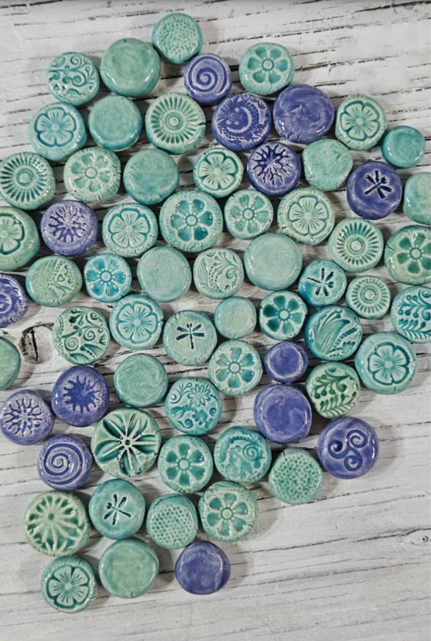 Sharing this group of handmade circle tiles. 💙 They’re perfect to use in your mosaic art or grouped together in a dish for coffee table decor. 💙 For mosaic tips, tutorials, inspiration, and so much more please visit my YouTube channel: YouTube.com/julieweilbacher. Follow @julieweilbacher on Instagram for all things mosaic art. circle tile - mosaic - handmade ceramics - mosaic art - coffee table decor - penny tile - handmade tilee

#LTKFindsUnder50 #LTKHome