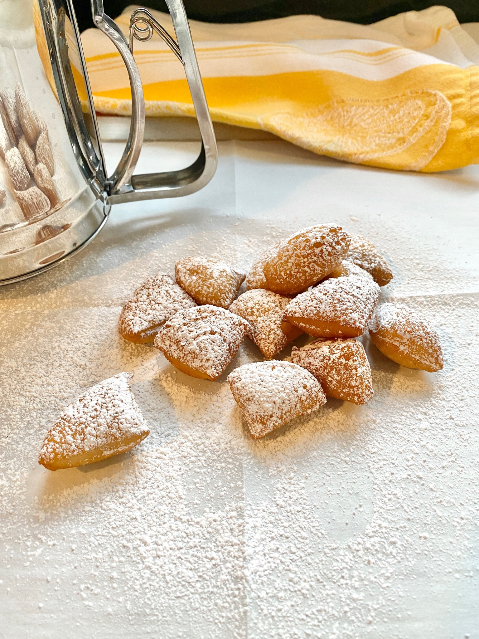 Puff Pastry New Orleans-Style Beignets 
Ingredients:
I - can biscuits 
Confectionery Powered Sugar 
Cooking oil
Instructions:
Heat oil to hot it will bubble when adding puff
Add 4 puffs and cook in batches
Remove puff when golden brown 
Cool puffs on paper towel lined plate 
Sprinkle with Confectioners Sugar and serve 
Or Make dipping icing with milk and confectioners sugar (my preference) 