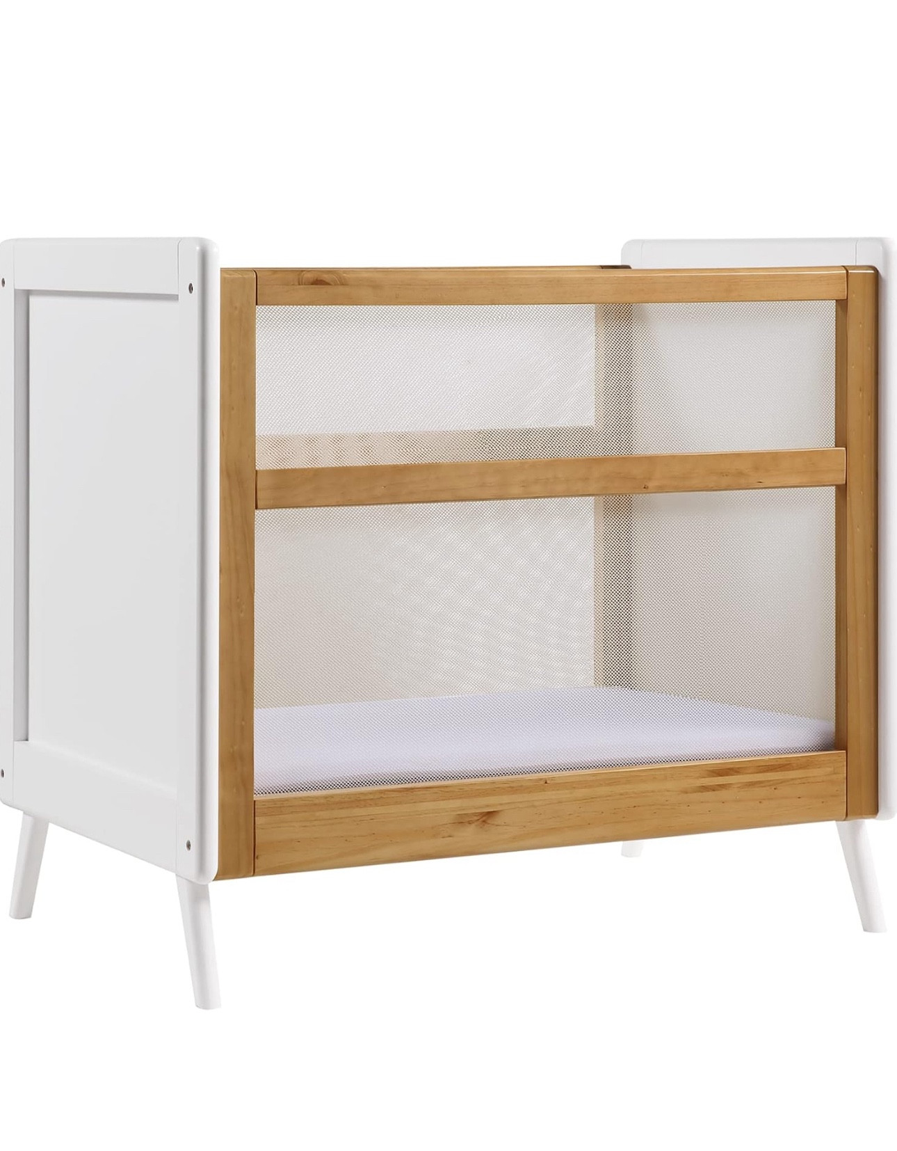 Breathable baby, dual height mini crib, multifunctional from newborn to toddler, 
The mesh sides are the reason I love it so much, baby can’t get their arms or legs stuck and they also won’t be able to throw out their paci/bottle throughout the night 🤍👌🏼 the perfect combo
And with the minimalistic design, it suits any style of nursery 

#LTKbump #LTKfamily #LTKbaby