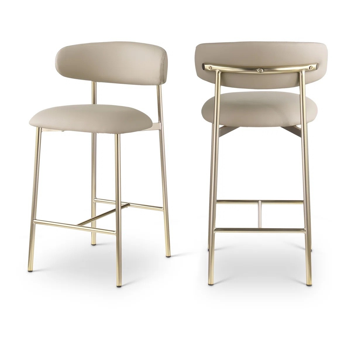 This set of 2 taupe vegan leather counter stools from Wayfair has such a sleek, polished look. I love the softly rounded backs, slim gold-tone metal frames, and built-in footrests for a kitchen island or breakfast bar. The set is currently marked 28% off and shown at $289.99. #WayfairFinds #CounterStools #KitchenIsland #BarStools