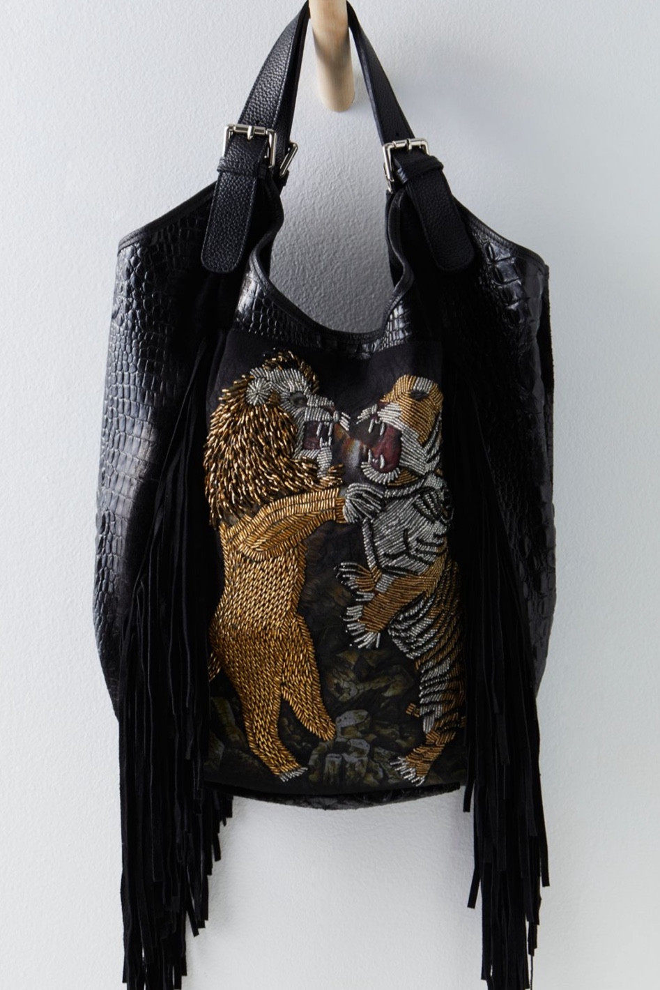 Fringe. Tiger. Say no more. If I could afford this perfect bag- it’d be in my closet 😍 🐅 #eyeofthetiger

#LTKItBag #LTKStyleTip