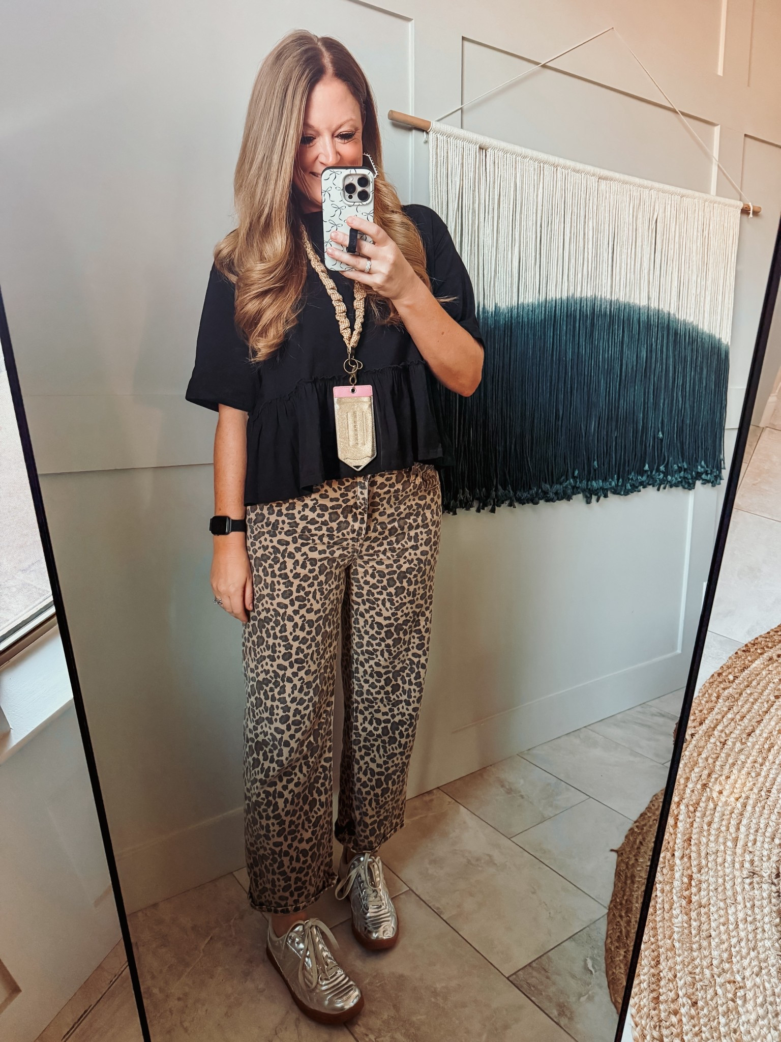 I have this little ruffle tee from Amazon in four colors now 🖤

Black tee: regular medium
Leopard pants: tts
Silver sneakers: tts
Lanyard: shop andi
Badge holder: Walmart 

#LTKWorkwear #LTKOver40