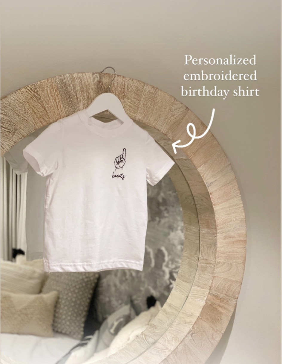 I found this top from @BeingBridget and ordered it for Boots first birthday. It’s such a cute and unique top and they make them in many ages. It’s a fun gift for parents too- after all, we love for our kids to look cute 📸🫶

#LTKbaby #LTKGiftGuide #LTKkids