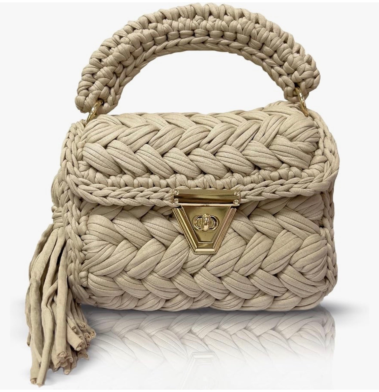 okay I cannot stop staring at this bag 🫶 the chunky woven texture, the gold hardware, the little tassel — it’s giving expensive without the price tag. this is the summer bag. linked 👇

#LTKootd #LTKSeasonal #LTKU