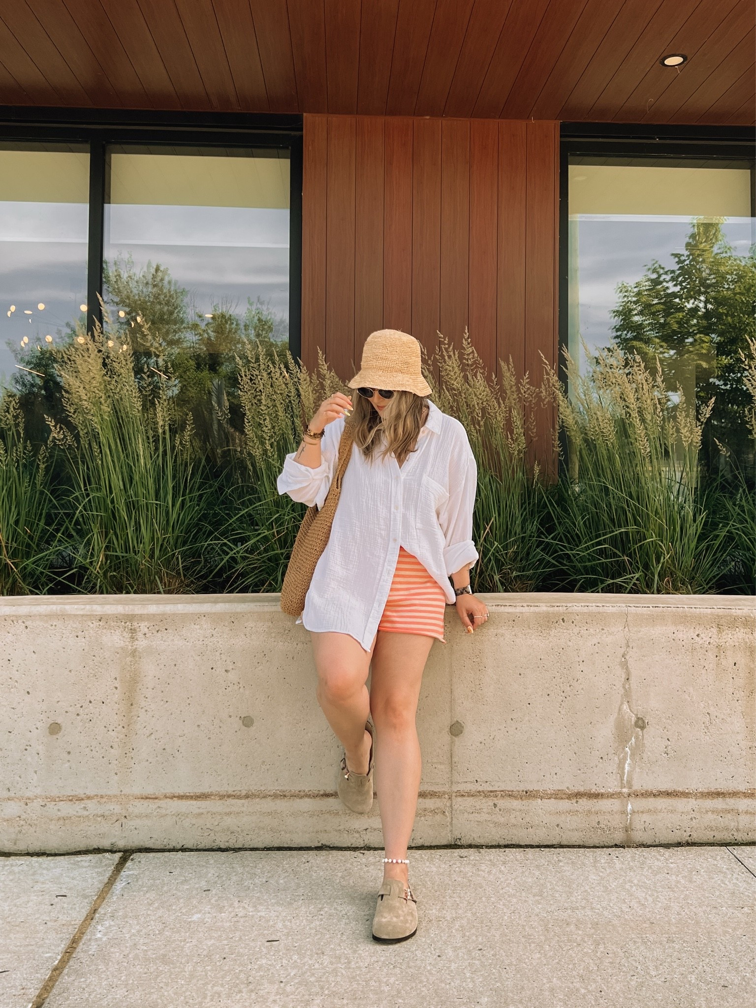 Beach outfit! Wearing my usual size L in both the striped shorts and oversized white button up. I’m a 9.5-10 and wear a 40 in the Birkenstock Boston clogs. Linked similar straw bucket hats

#LTKsummer #LTKmidsize #LTKsale