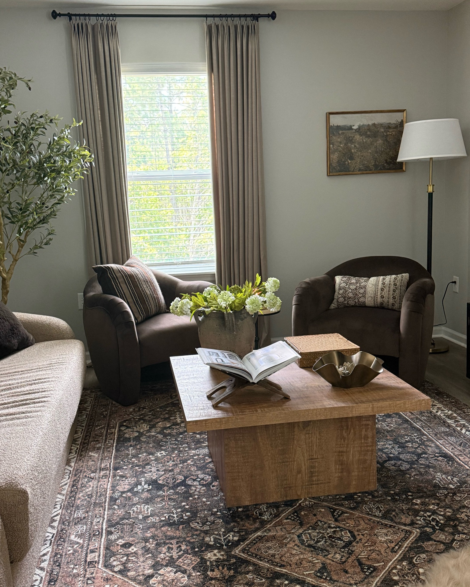 Lots on sale in my loft! Love this cozy moody space 😍 

Moody living room, coffee table, vintage inspired rug, accent chairs

#LTKHome #LTKSaleAlert