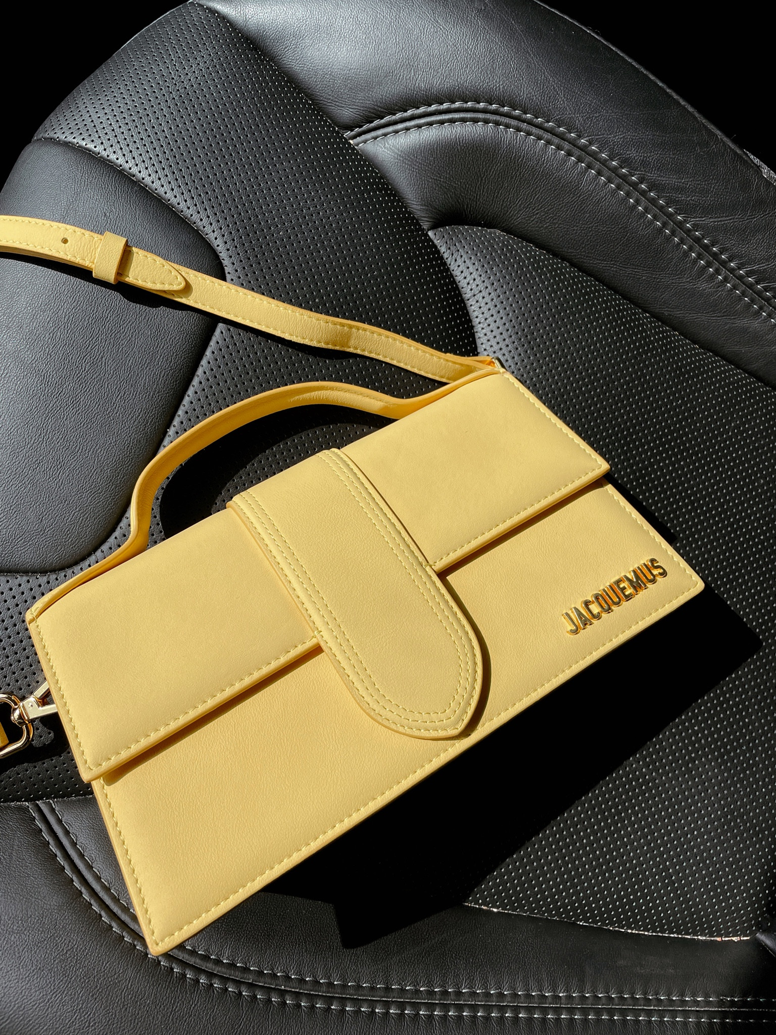 Jacquemus Le Grand Bambino tote bag, farfetch, yellow, colorful fashion, crossbody purse, designer bag, small bag, spring / summer, fall / winter, neutral, minimalistic style, leather bag, gift ideas for her

#LTKstyletip #LTKitbag #LTKGiftGuide