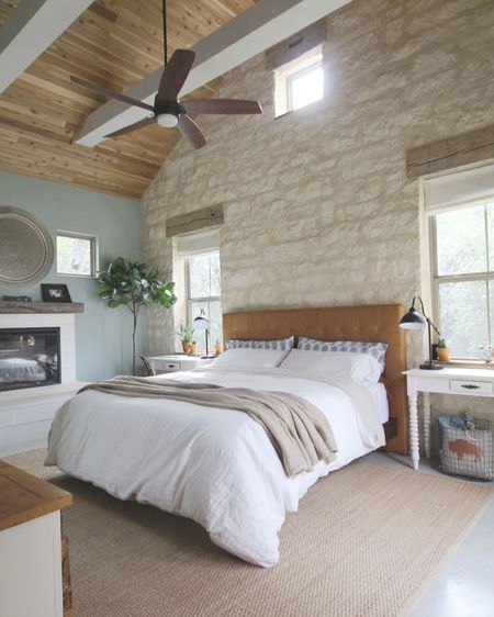 Rustic casual bedroom

Actual bed is from Article. Wall is cream limestone, ceiling is cedar fence pickets, wall color is SW Silvermist. 

Go to wildfireinteriors.com for more information! 

#LTKhome