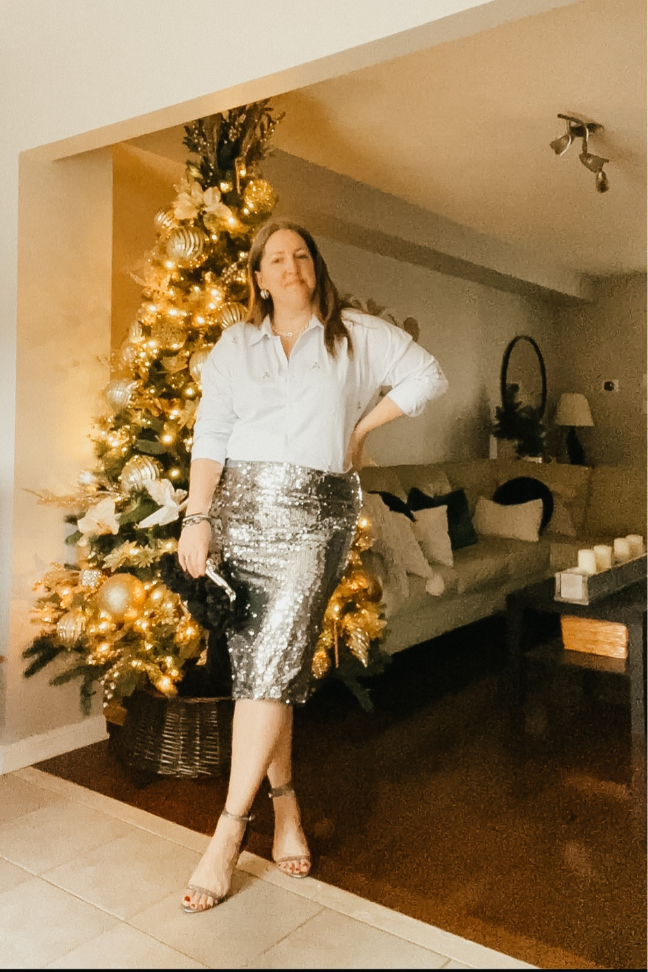 Christmas outfit
Rhinestone button down shirt, sequin skirt, black purse, silver jewelryy

#LTKStyleTip #LTKSeasonal #LTKHoliday