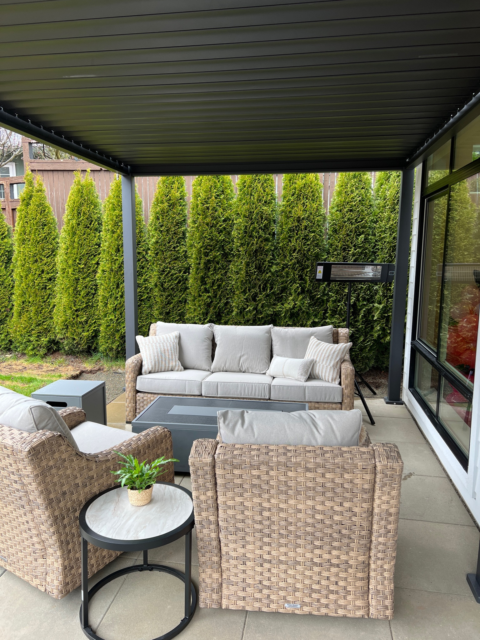 New outdoor set up! 
Fire pit - Costco 
Heater lamp (we are going to install overhead) - Costco
Pillows - Target 
Couch set - Walmart 
Pergola - Amazon 

#LTKsalealert #LTKhome