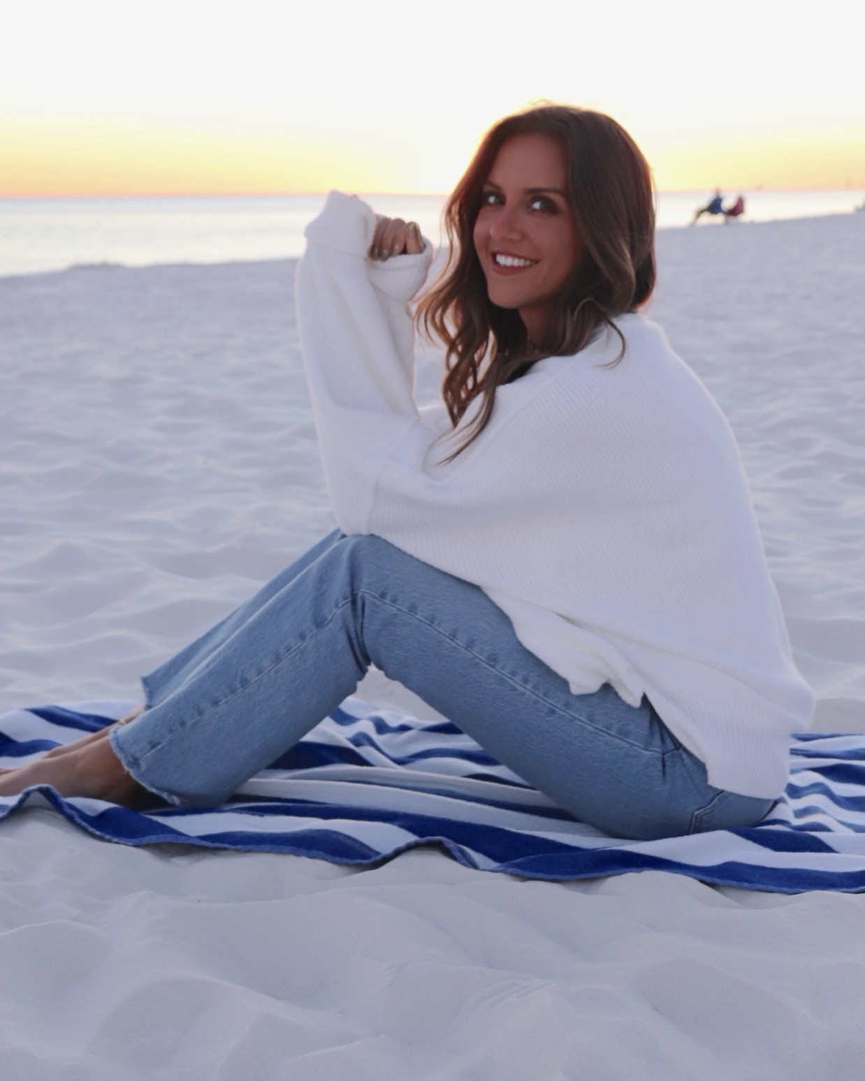 Oversized white sweater and mid rise light wash denim 

#LTKStyleTip #LTKSeasonal
