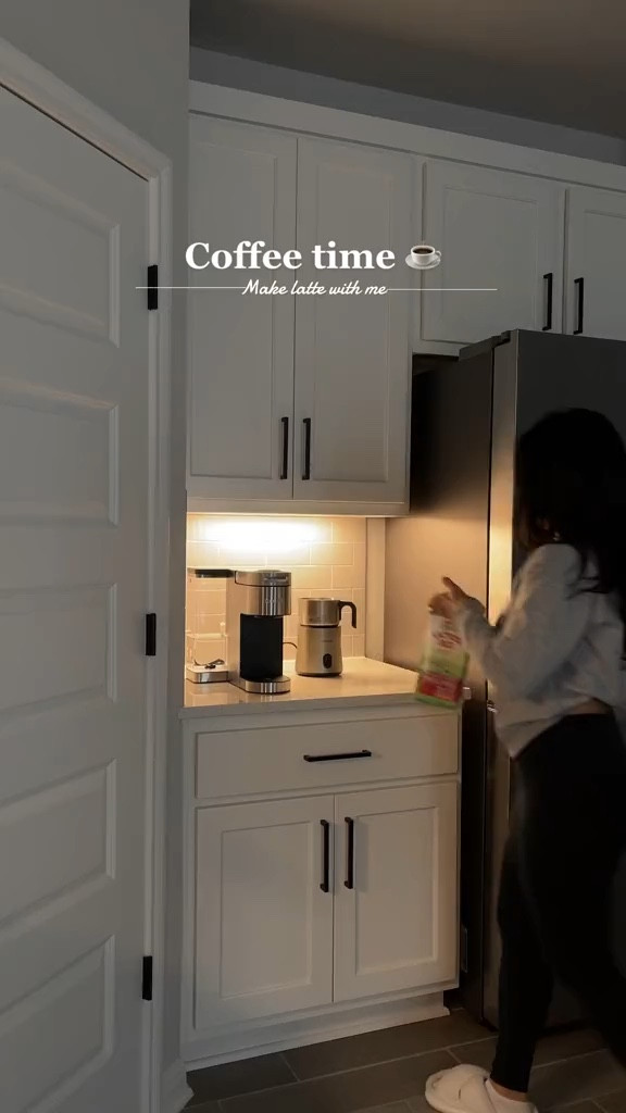 Sleek stainless steel Keurig coffee machine, milk frothing, clear coffee mug, sweater 

#LTKFind #LTKhome