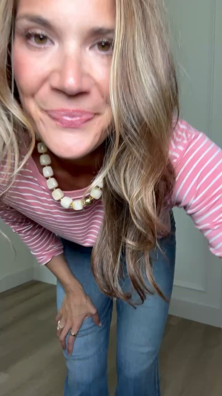 The kind of striped tee that makes jeans feel a little more fun. I love the closer fit through the body and sleeves, especially going into that weird warm-now, cooler-later time of year.

striped top, long sleeve tee, casual outfit, jeans outfit, transitional style, fall basics, everyday outfit, pink stripe top, tall girl style, stangandco

#LTKootd #LTKSeasonal #LTKTall