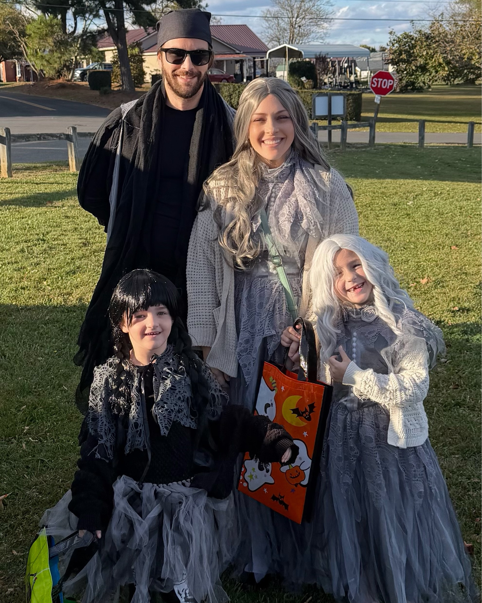 Trunk or Treat family photo outfits fun 🤩 Halloween 🎃 is our favorite holiday besides Christmas 🎄 so we love to dress up 👗 and enjoy all the fall festivities. Wigging out with my girls for the first time was so special. 👧🏻Can’t wait till next week so we can go all out with face paint 🤡 and candy comas 🍬#LTKHalloween

#LTKHoliday #LTKFindsUnder50 #LTKSeasonal