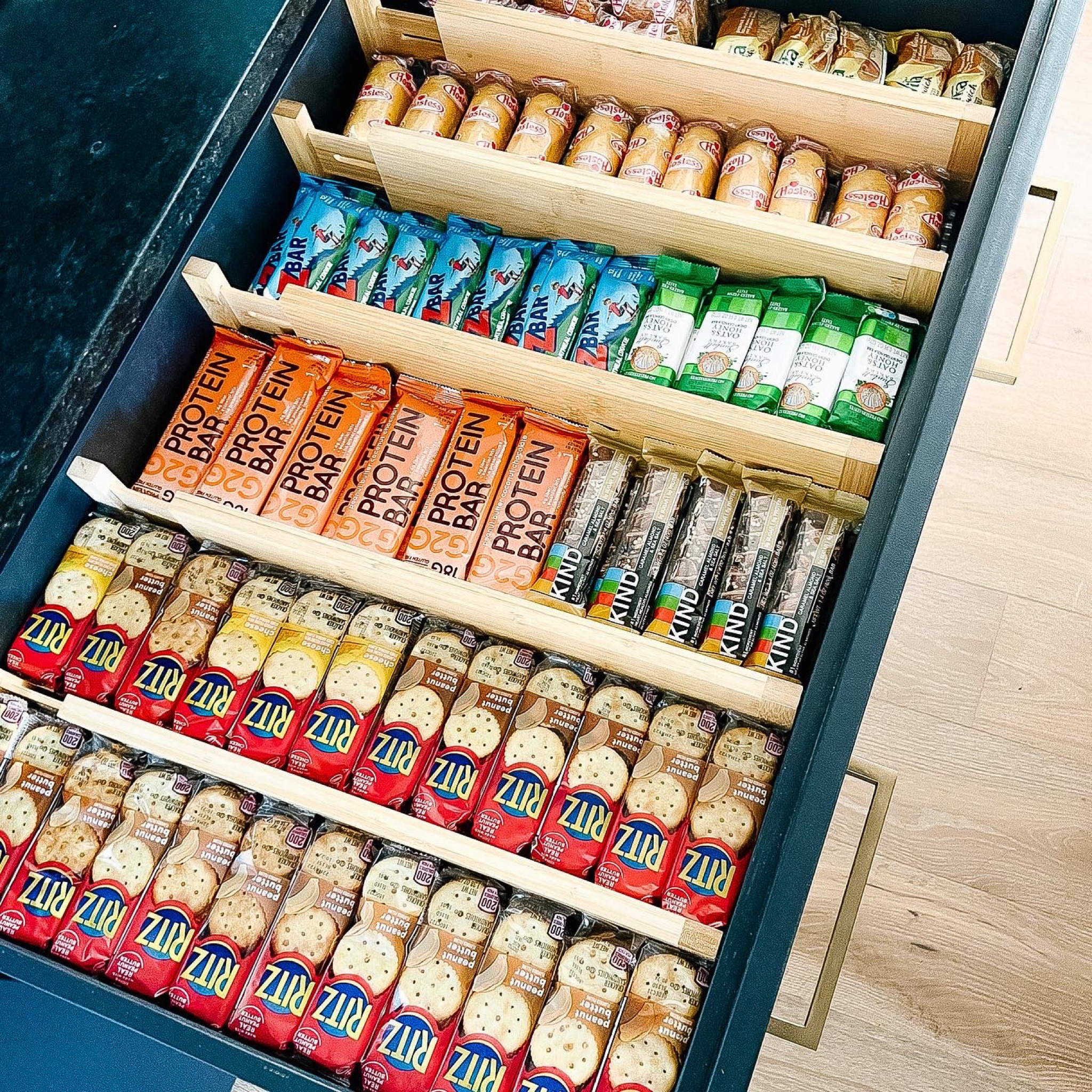 Secret to a happy home? Snacks on snacks…. on snacks. Feeling sad? Grab a snack. Feeling happy? Grab a snack. Kids won’t be whining? Grab a snack. Follow for more health and wellness tips.

Quick word on the organization: large, shallow drawers are perfect for small grab and go foods. They keep everything contained, easily accessible and allow you to quickly take stock of what you have and what you don’t. Drawer dividers create aisles and keep your snacks lookin’ … like a snack. LOL. Okay. I need to stop.

#LTKunder50 #LTKfamily #LTKhome