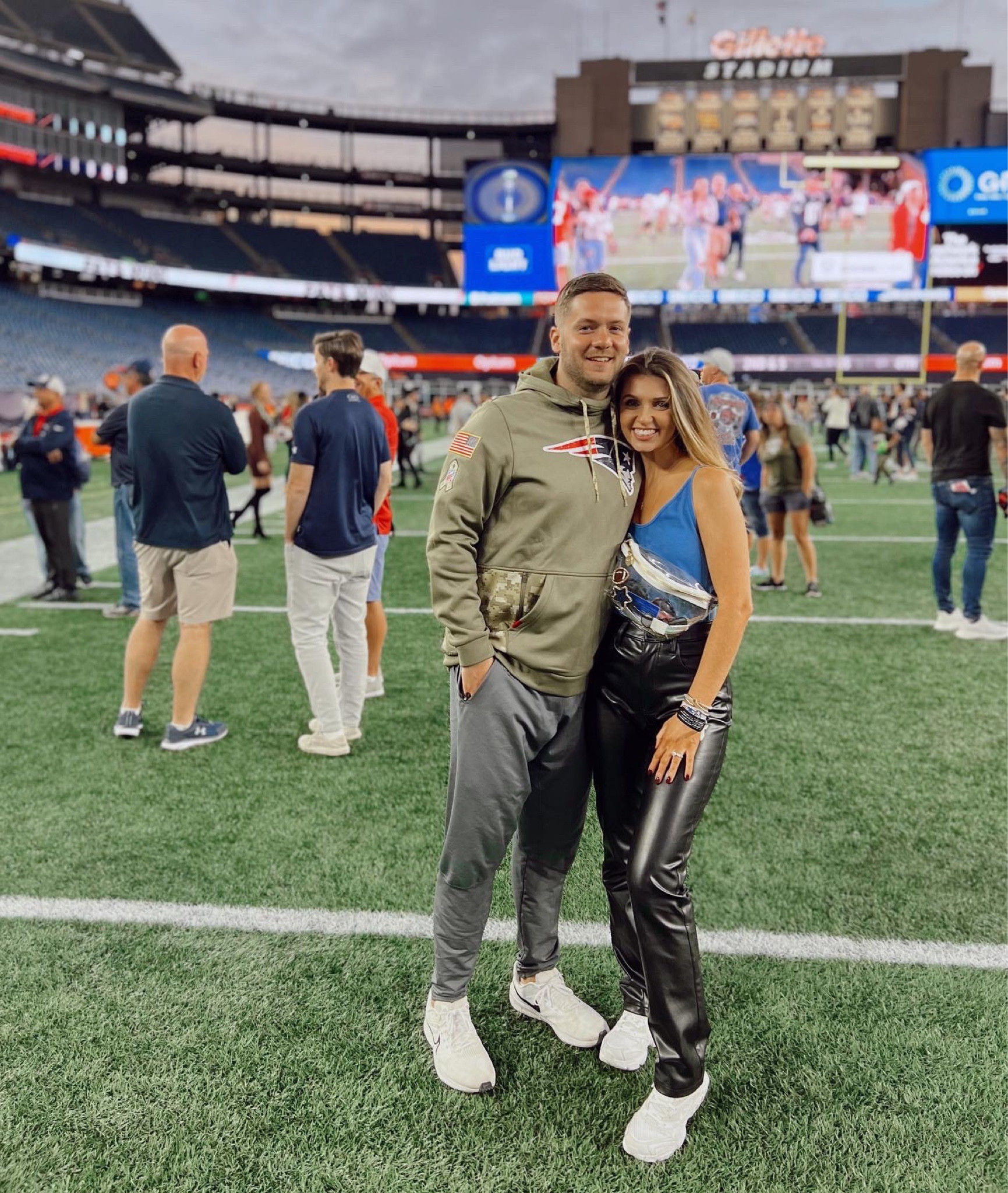 Pats win ❤️💙 nfl game day outfit - leather pants white chunky sneakers stoney clover clear bag 

#LTKstyletip #LTKSeasonal #LTKunder100