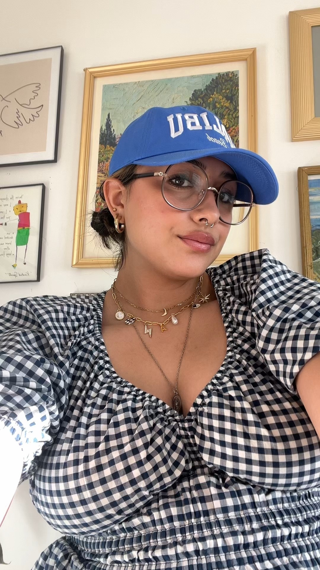 this old navy gingham v-neck top with puff sleeves is my new favorite and perfect for expecting mommy’s or girlies looking for waist flattering tops! styled with a blue malibu hat, red flats and wide leg jeans! i’m wearing a size large top and size 14 pants 