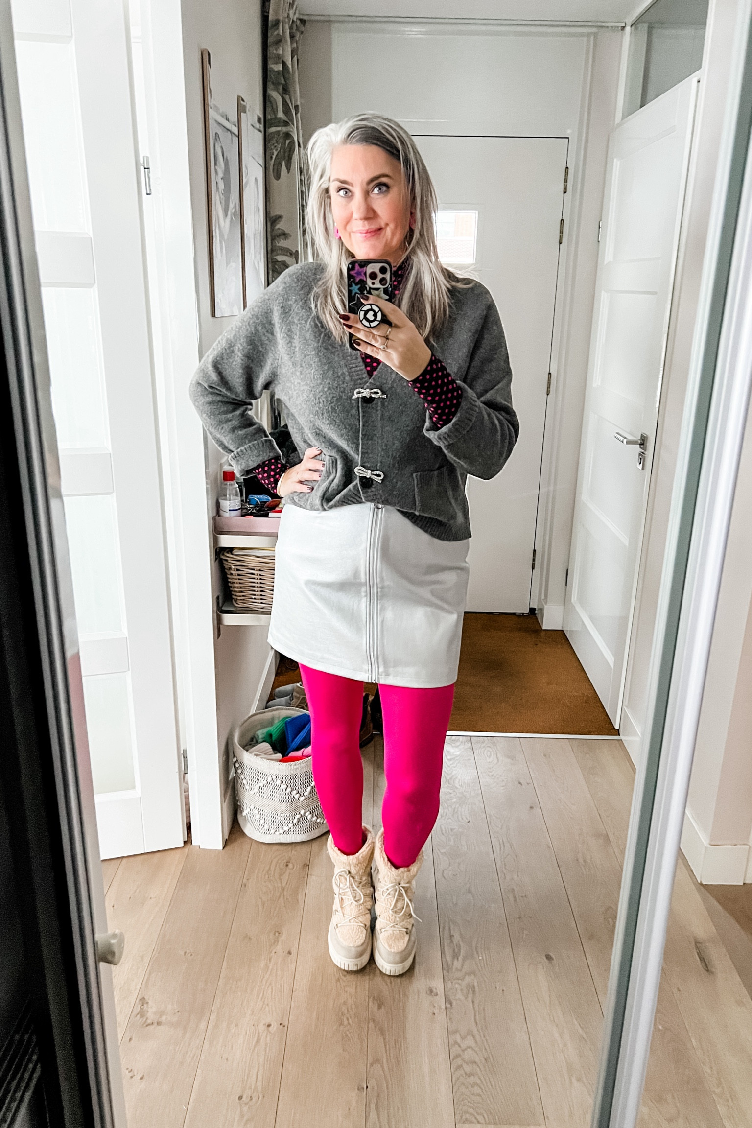 Ootd. Tuesday. Grey cardigan embellished with Strass bows over a mesh top (Norah, 38) silver skirt (Wehkamp), pink tights (Calzedonia) teddy boots (van Haren). 



#LTKstyletip #LTKeurope #LTKover40