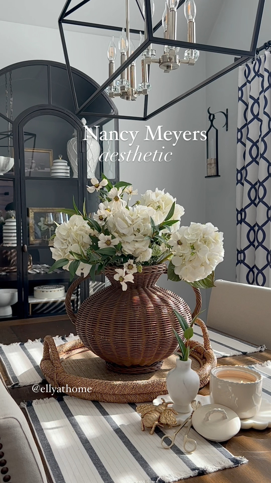 Do you love Nancy Meyers style too?! love that my new rattan vase comes with a glass vase for easy styling and for fresh flowers! Spring florals tray! Shop my new beautiful Antonia rattan vase, white florals, hydrangeas, brass tray, marble vase, lavender candle, candle accessories, rattan tray, black display cabinet, chandelier, canisters, Amber wine glasses. Spring home decor accessories. McGee & Co, target, amazon home, crate & barrel, Magnolia, Walmart. 

#LTKHome #LTKFindsUnder50 #LTKSaleAlert