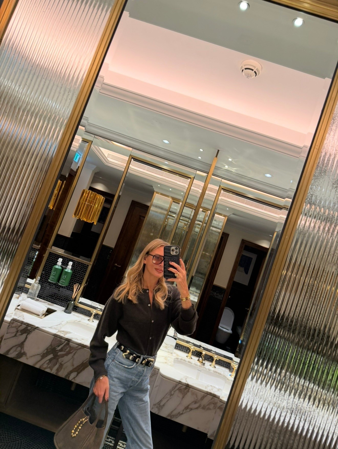 Levi’s 501 jeans, Almada label cardigan, Khaite Benni belt,